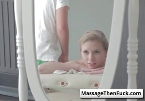 Massage scene featuring an old blonde beauty